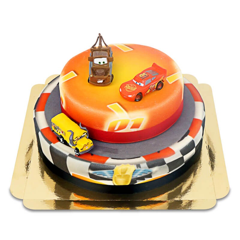Cars 2 - Lightning McQueen, Cruz Ramirez en Takel op twee-verdiepingen circuit taart met lint