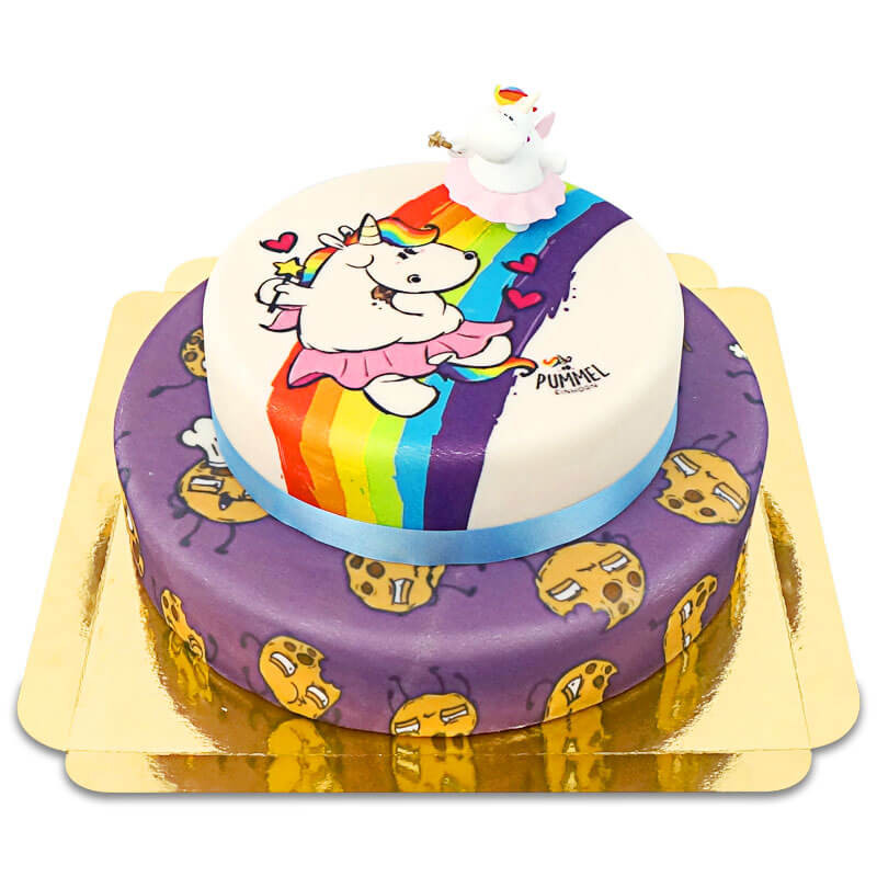 Chubby unicorn op twee-verdiepingen koekjes taart