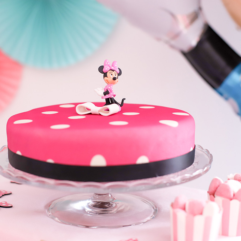 Minnie Mouse op taart met figuur en suiker strikje bestellen